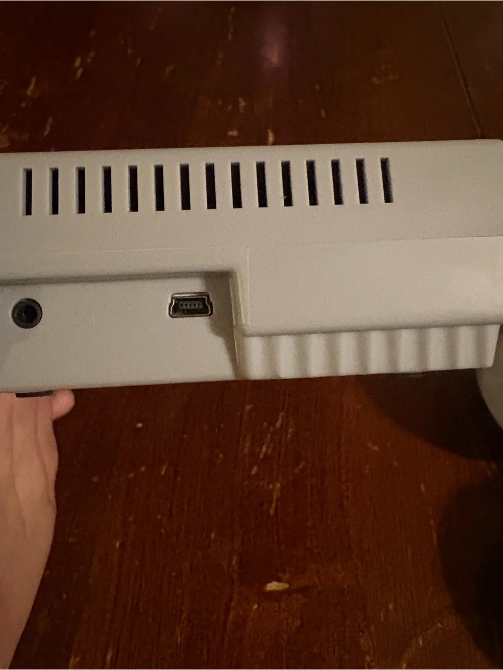 Nintendo Mini Gaming Console in Gray with Purple Buttons and Gray Controllers